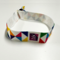 Branded polyester wristbands with custom text and logo.