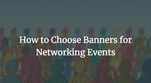 Display banners set up at a networking event for branding.