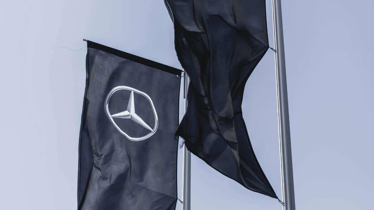 Two black Mercedes flags