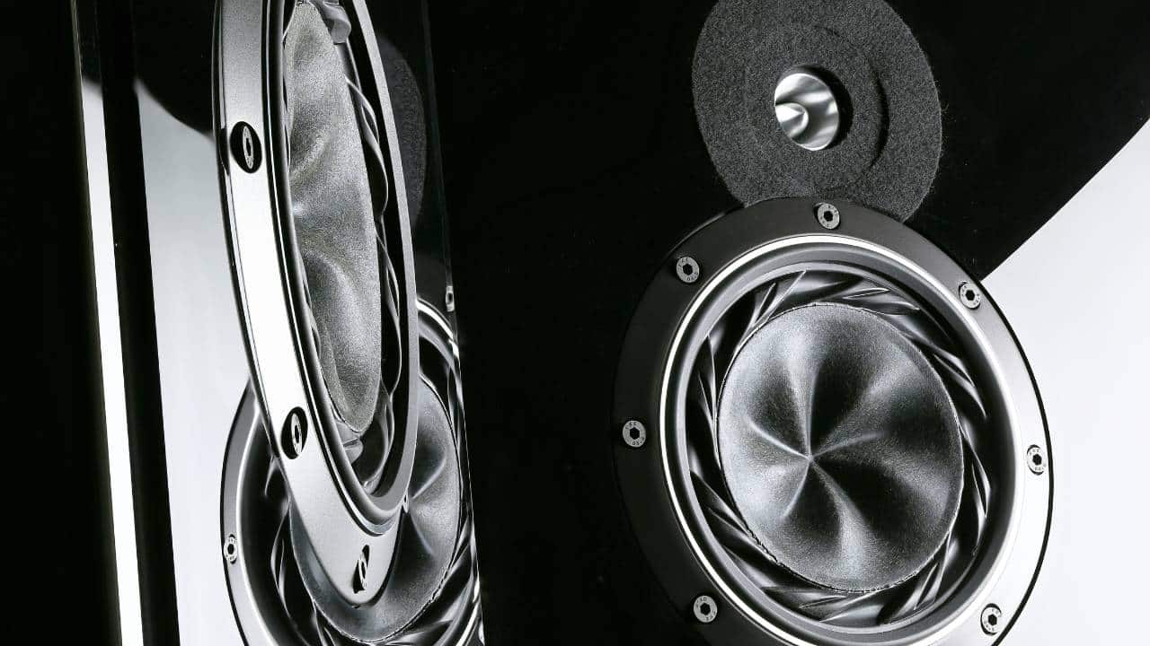 A black and white photo of large speakers