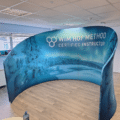 C booth zipper wall display assembled with printed fabric.