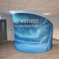 C-shaped booth zipper wall for open-front exhibition displays.