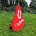 Pitch pop up display banner assembled beside a sports pitch.