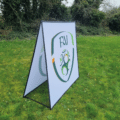 Pitch-side pop up display showing branding at a sports event.