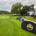 Pop up advertising display for sports pitch perimeter.