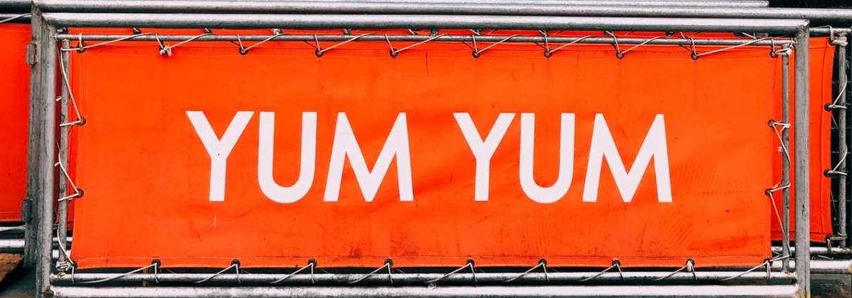 Person writing copy for effective banner advertising.