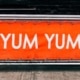 Person writing copy for effective banner advertising.