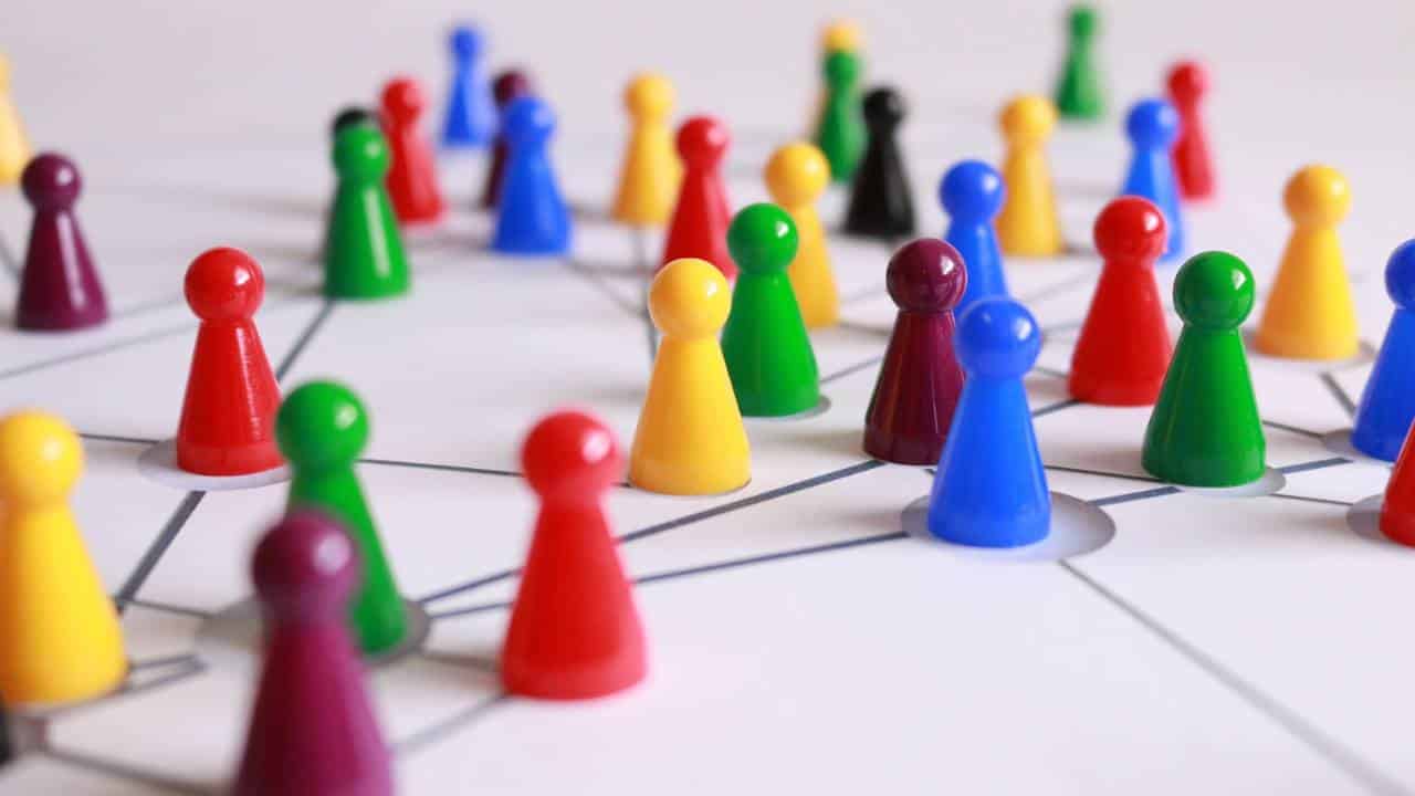 Several board game pieces on a white surface