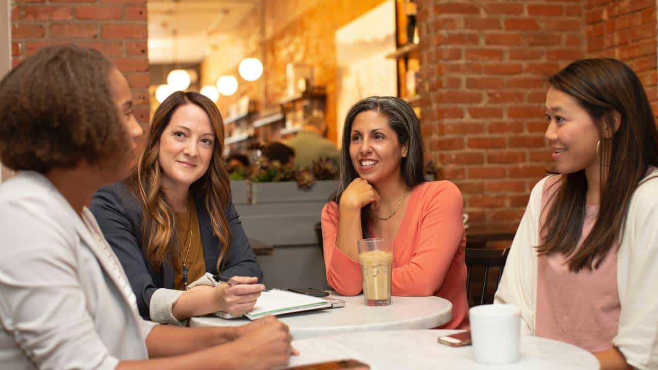 Several women talking to each other