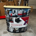 Promotional round counter stand for branded exhibitions.