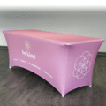 Stretch fabric table cover with custom print for events.