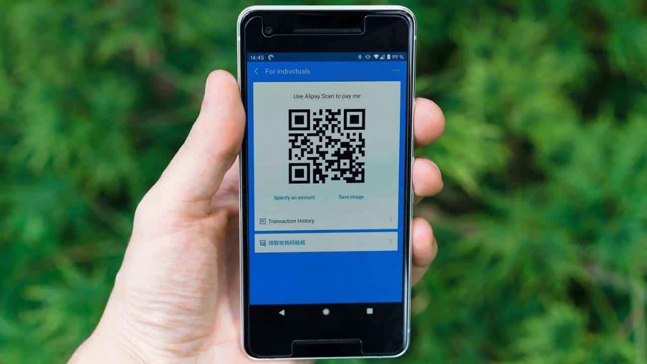 A QR code shown on a smartphone's display