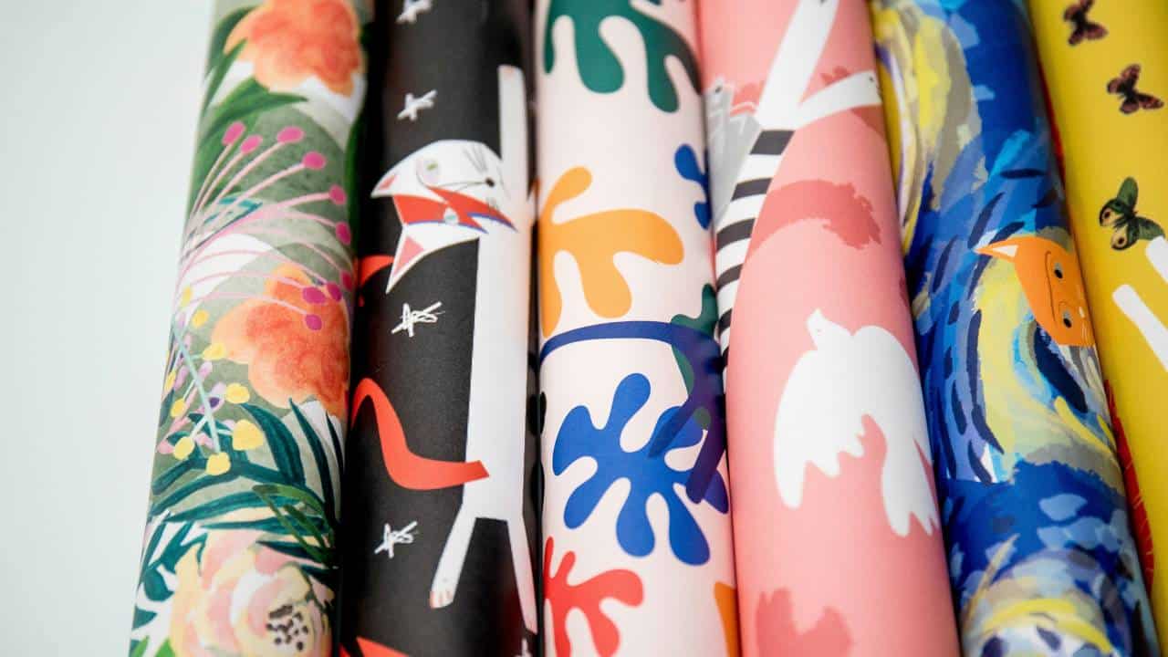 Several rolls of colourful paper