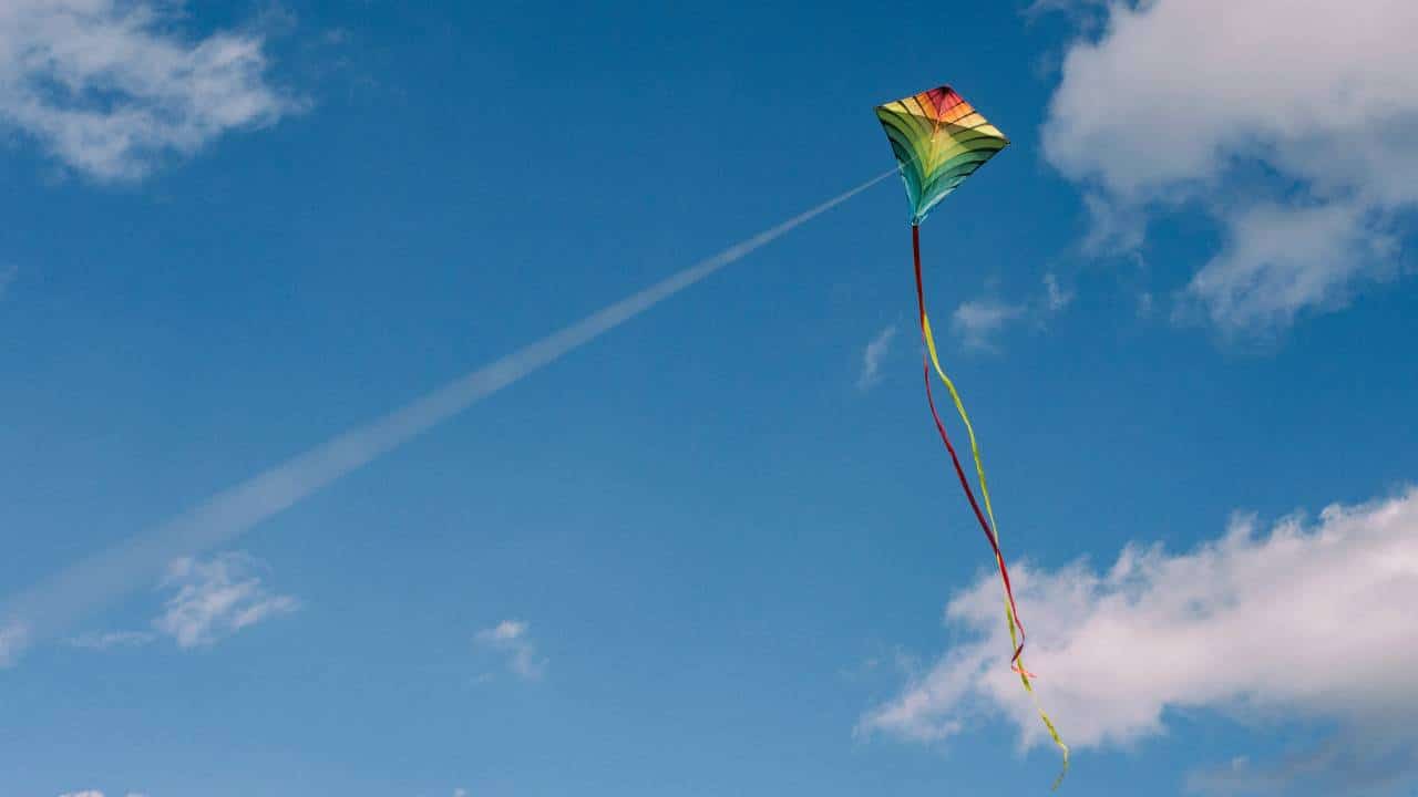 A colourful kite flying in the sky