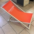 Lancaster branded printed deckchair at outdoor venue.