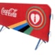 Custom printed crash barrier cover for outdoor events.