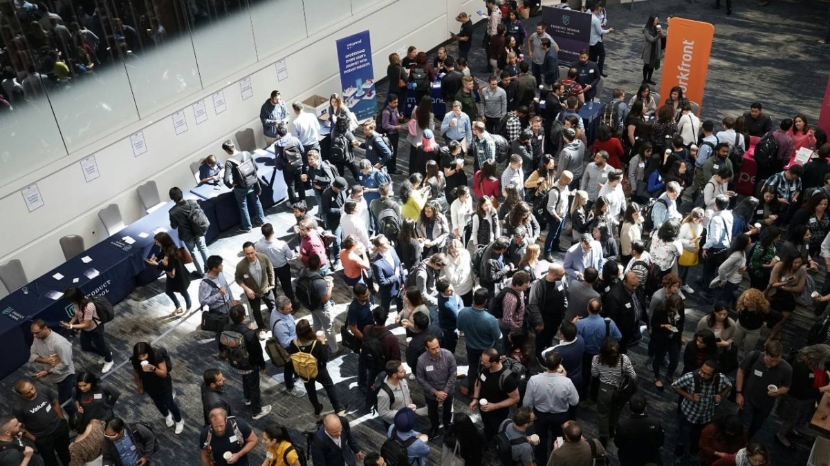 Lots of people attending a business conference