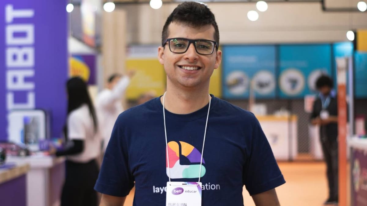 A photo of a young man at a business conference