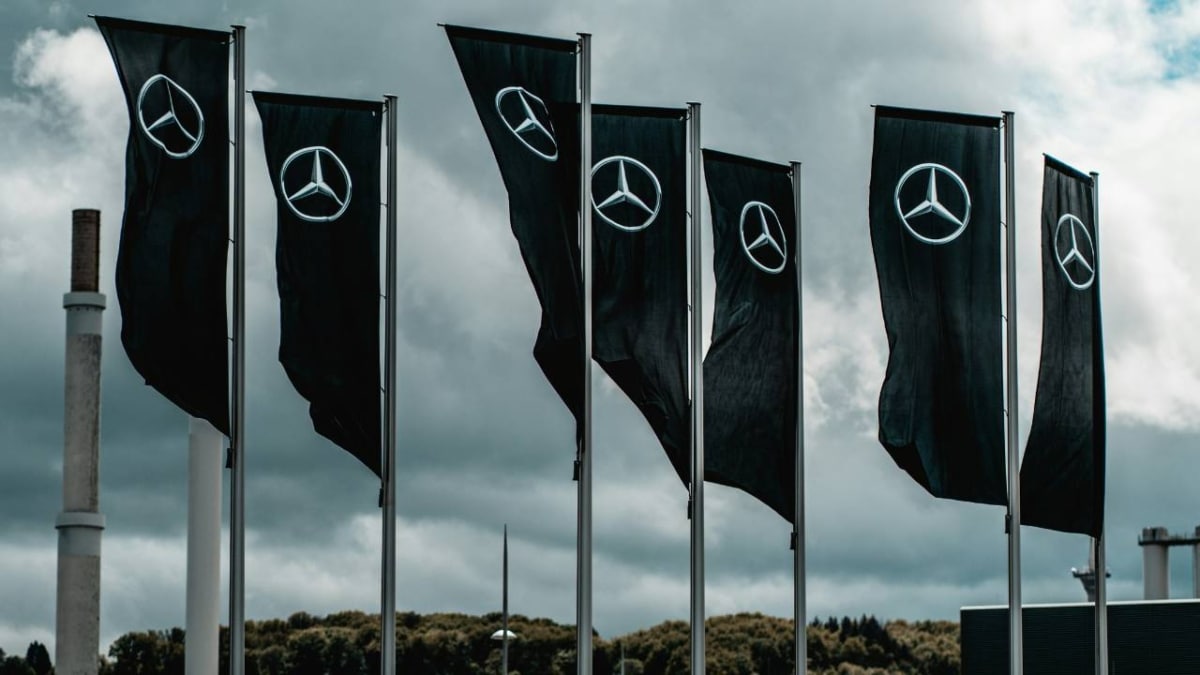 A group of black flags featuring the Mercedes logo